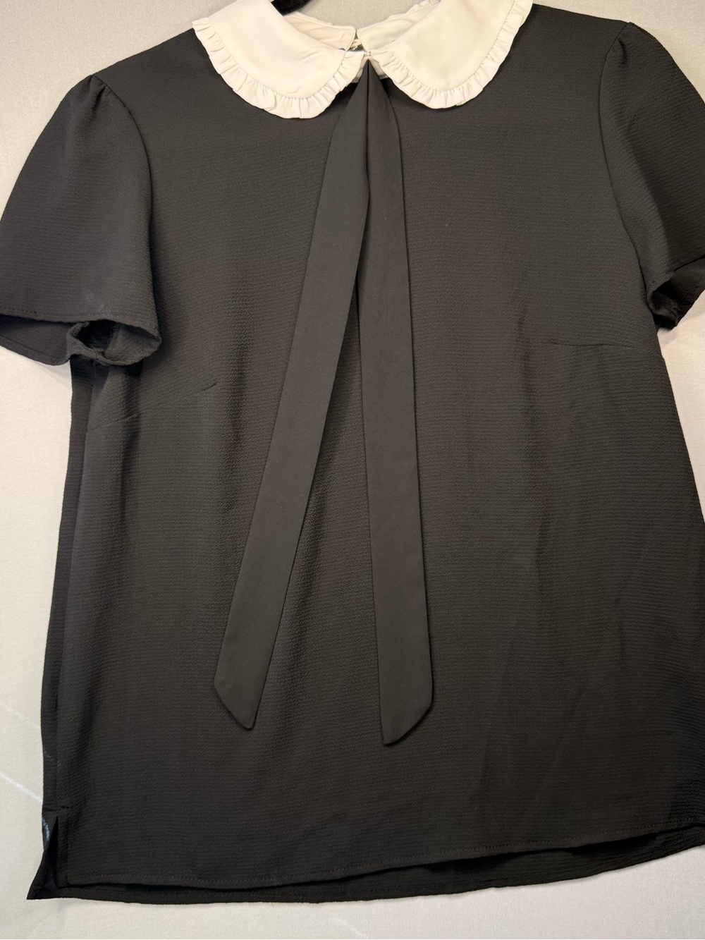 CeCe Black Short-Sleeve Blouse with White Ruffle Peter Pan Collar and Neck Tie - Picture 5 of 12